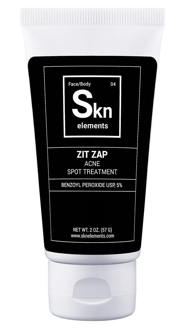 A white tube of Zit Zap Acne Spot Treatment by Skn Elements contains Benzoyl Peroxide USP, 5%. The black label with white text describes it as suitable for both face and body use, weighing 2 oz (57 g).